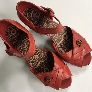 Clark’s red leather shoes